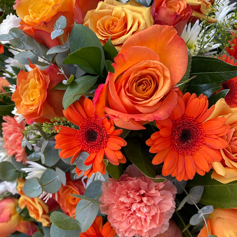 Orange-cream-white-casket-coffin-spray-funeral-flowers-delivered-strood-Rochester-Medway-kent