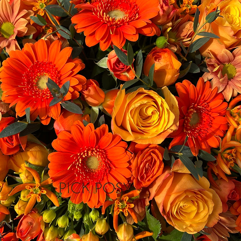 Loose-orange-posy-pad-funeral-flowers-tribute-delivery-strood-rochester-medway-kent