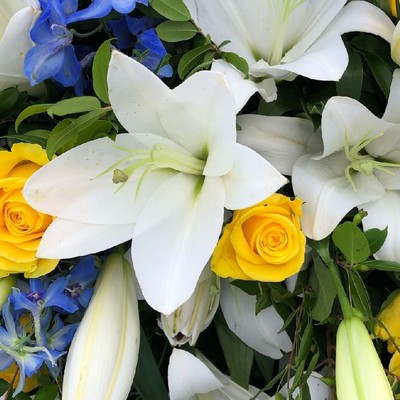 white-lilies-yellow-roses-blue-delphiniums-lily-casket-coffin-spray-funeral-flowers-tribute-delivered-strood-rochester-medway-kent