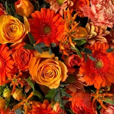 Loose-orange-posy-pad-funeral-flowers-tribute-delivery-strood-rochester-medway-kent