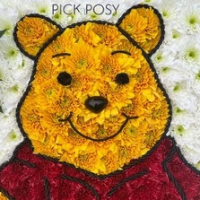 Winnie-the-pooh-bear-funeral-flowers-tribute-wreath-strood-rochester-medway-kent