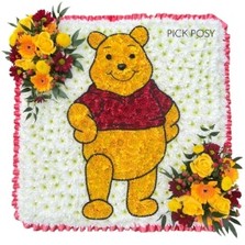 Winnie-the-pooh-bear-funeral-flowers-tribute-wreath-strood-rochester-medway-kent